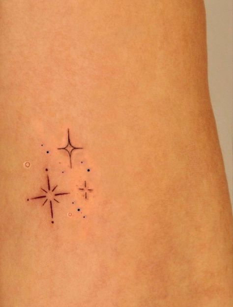 New Years Tattoo Ideas, Diamond Sparkle Tattoo, Stick And Poke Cover Up Tattoos, Twinkly Star Tattoo, Libra Sparkle Tattoo, Twinkle Tattoo Design, Sparkle Star Tattoo Hand, Dot Star Tattoo, Tiny Firework Tattoo