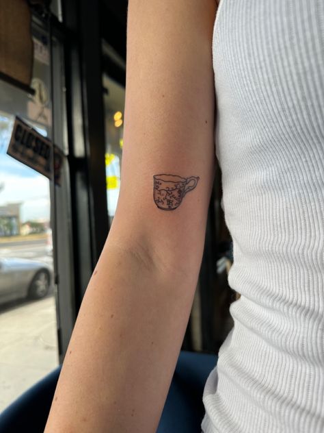 cute custom dainty tea cup tattoo #tattoo #teacup #teacuptattoo #daintytattoo #finelinetattoo Tea Cup With Tea Bag Tattoo, Tiny Mug Tattoo, Tea Cup Fine Line Tattoo, Simple Teacup Tattoo, Cup And Saucer Tattoo, Fine Line Teapot Tattoo, Cute Tea Tattoo, Cup Overflowing Tattoo, Tiny Tea Cup Tattoo