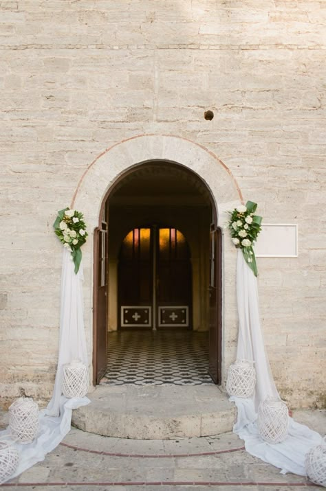 Greece's natural beauty lends itself to some of the most incredible affairs ever, like this elegant white wedding, especially when you have Peter & Veronika Photography to capture it all. Church Entrance, Elegant White Wedding, Wedding Church Decor, Church Wedding Flowers, Wedding In Greece, Wedding Doors, Tafel Decor, Church Wedding Decorations, Wedding Entrance