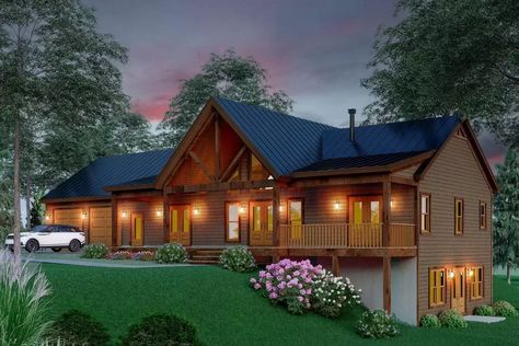 This rustic ranch house plan gives you 2 bedrooms, 2 baths and 1,421 square feet of heated living space. Designed on a walkout basement that opens on the right, it is ideal for your side-sloping lot. A pair of doors opens from the 11'-deep front porch to reveal a dramatic vaulted interior and a floor plan open front to back. Each bedroom in this country ranch also has it's own set of French doors providing access to semi-private front porches. The great room vault matches the porch vault line an Rustic Ranch House, Corner Soaking Tub, Sloping Lot House Plan, Property Ideas, Basement House Plans, Garage Floor Plans, Ranch House Plan, Cabin House, Ranch Style House Plans