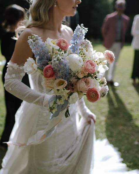 I loved Victoria’s bridal bouquet. The pastel blue delphinium with the peach ranunculus were perfect 🤍✨🍑 Photographer: @leahcruikshank… | Instagram Soft Spring Wedding, Delphinium Bouquet, Moody Wedding Flowers, Peach Ranunculus, Colorful Bridal Bouquet, Elegant Garden Wedding, Flower Aesthetics, Garden Wedding Bouquet, Bridal Bouquet Spring