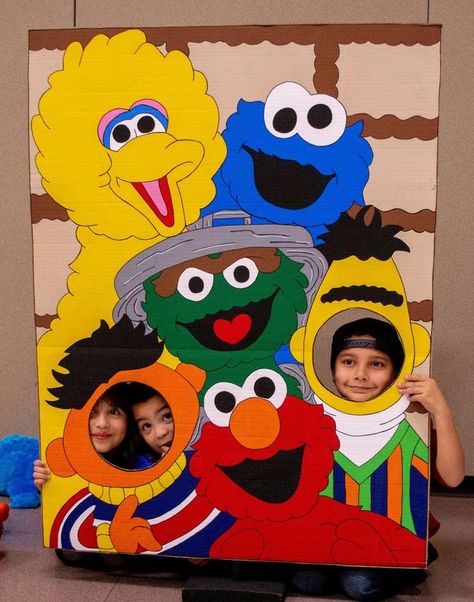 Theo’s Sesame Street 1st birthday | CatchMyParty.com Sesame Street Photo Booth, Sesame Street Birthday Decor, Seaseme Street Birthday Party, Elmo Decorations, Sesame Street Decorations, Sesame Street Birthday Party Ideas, Street Banners, Sesame Street Birthday Party, Elmo Party