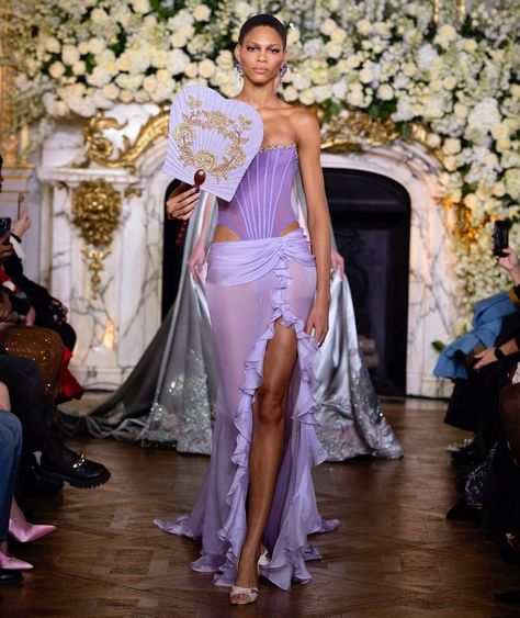 Look 15 Silk chiffon draped skirt and corset look styled with Korean fan handcrafted by a local traditional artisan, made with lavender… | Instagram Miss Sohee, Skirt And Corset, Corset Look, Couture 2024, Grammy Dresses, Corset Looks, High Fashion Runway, Golden Shadow, Princess Core