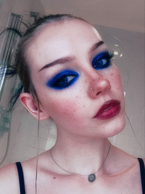 Funky Blue Makeup, Blue Face Makeup Looks, Alt Blue Makeup, Blue Trad Goth Makeup, Electric Blue Eye Makeup, Blue Alternative Makeup, Blue Witch Makeup, Black And Blue Makeup Looks, Blue Grunge Makeup