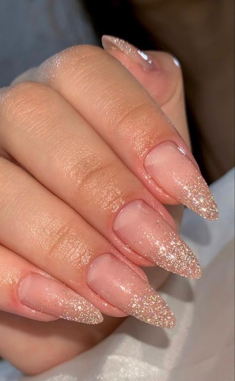 Glitter Nails Ombre Sparkle, Gold Glitter Ombre Nails Almond, Glitter Fade Nails Almond, French Gold Glitter Nails, Sparkle Ombre Nails Almond, Shimmer Ombre Nails, Nude Nails With Glitter Tips, Gold Ombre Nails Glitter, Champagne Sparkle Nails