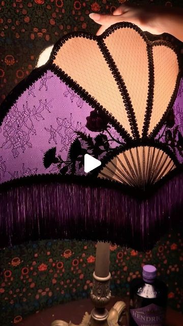 Ace of Shades on Instagram: "I was commissioned by the lovely folks at Accidentally Wes Anderson (@accidentallywesanderson) to create this lampshade inspired by the decadence of Hendrick’s Grand Cabaret Gin from their Cabinet of Curiosities collection! 💜✨ I used the colors of the bottle to custom dye the silks and fringe, incorporated rose appliqués as it’s one of their signature ingredients, and incorporated thistle appliqués to represent Scotland, where it’s distilled. Grand Cabaret is inspir Ace Of Shades, Accidentally Wes Anderson, Silk Lampshade, Handmade Lampshades, Diy Lamp Shade, Cabinet Of Curiosities, Wes Anderson, Diy Lamp, Maximalism