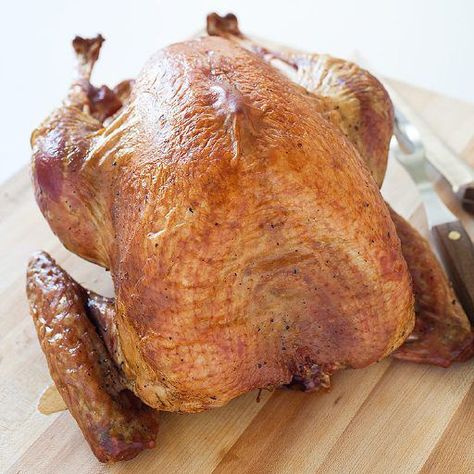 Besides freeing up your oven for other dishes, roasting your turkey out on the grill also means that you needn’t worry about constantly monitoring the bird to ensure a perfectly juicy, tender turkey. Traeger Smoked Turkey, Cooking Thanksgiving Turkey, Carving A Turkey, Smoked Turkey Recipes, Roast Turkey Recipes, Grilled Roast, Grilled Turkey, Whole Turkey, America's Test Kitchen Recipes