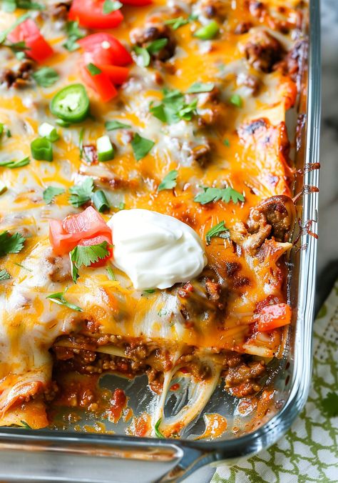 Dive into layers of flavor with this Cheesy Taco Lasagna Bake! Combining the zest of tacos with the comfort of lasagna, this dish is perfect for spicing up your dinner routine. It's loaded with lean ground beef, creamy ricotta, and plenty of cheddar, all seasoned with tasty taco spices. Ideal for a family meal or a festive gathering. Love it? Pin this recipe to your favorite board and share the joy of cooking with friends! Lasagna Taco, Mexican Taco Lasagna Recipe, Taco Lasagna Recipe With Noodles, Cheesy Taco Lasagna, Ground Turkey Mexican Lasagna, Mexican Lasagne, Mexican Lasagna With Corn Tortillas, Bacon Lasagna, Baked Lasagna Recipe