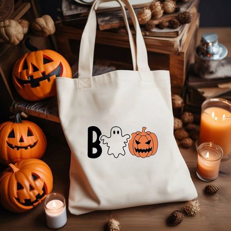 Dive into madness with the Madness Story Font. Ideal for creating eerie and dramatic Halloween text. 🎃📜#spookyfonts #creepytype #horrortext #scarycalligraphy #eerieletters Diy Halloween Tote Bag, Halloween Tote Bags Diy Paint, Fall Tote Bag Painting Ideas, Diy Tote Bag Design, Ghost Bag, Scary Font, Spooky Font, Fall Tote Bag, Halloween Text