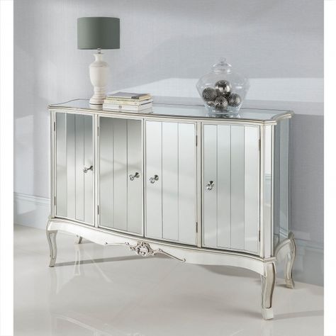 This marvelous mirrored sideboard from our collection of Argente glass furniture adds a lovely charm to your bedroom. Sure to brighten up your home in an instant, this stunning Venetian 4 door sideboard finished off with a antique silver trim is sure to impress across generations. Height: 92cm Width: 136cm Depth: 40cm Antique Silver Paint, French Style Mirrors, Credenza Furniture, Unique Sideboard, Mirrored Sideboard, Side Board, Solid Wood Sideboard, Large Sideboard, Silver Decor