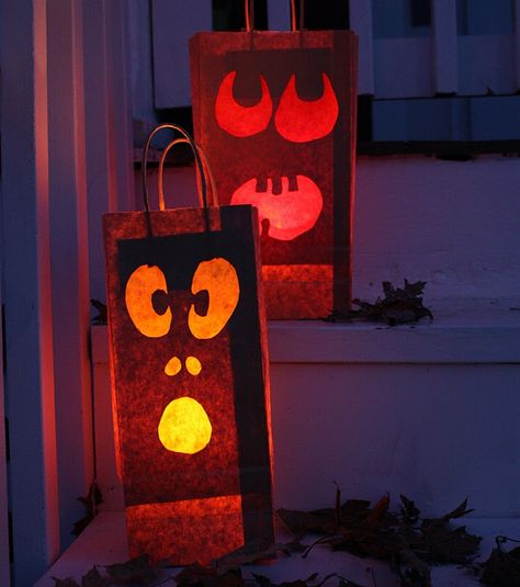 Halloween Luminaries: an inexpensive and festive way to light up your yard for Halloween.  Supplies:  under $5  Time: depends on how many you make Diy Halloween Luminaries, Halloween Paper Bags, Halloween Luminaries, Spooky Spooky, Candle Bags, Samhain Halloween, Homemade Halloween Decorations, Halloween Lanterns, Halloween Supplies