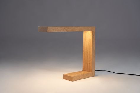 Modern LED table lamp made from solid oak or ash wood. Combination of modern minimalist design, energy-efficient eye-caring LED technology and traditional beauty of wood. Thanks to its modern design, it also provides a stylish decoration for your home, workplace and all living spaces. Table lamp size: Height 25 cm (9,8 in); Length 30 cm (11,8 in); width 7 cm (2.7 in); Thickness 2,5 cm (0.98 in). LED Strip Light: 12V LED power supply; Helios Professional 10 Watts total power, Service life more th Modern Wood Lamp, Cosy Office, Built In Table, Minimalist Desk Lamp, Wooden Desk Lamp, Contemporary Lamp, Lamp Rustic, Rustic Light, Cube Lamps