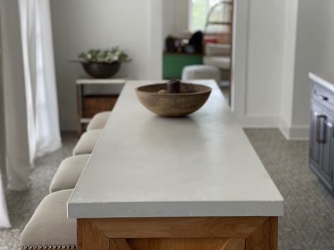 Concrete Island Countertop, White Concrete Countertops Kitchen, White Concrete Kitchen, White Kitchen Black Appliances, Farmhouse Kitchen Renovation, Polished Concrete Countertops, Springboro Ohio, Cement Countertops, Concrete Kitchen Island