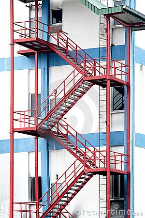 Emergency Exit Stairs Emergency Exit Stairs, Fire Escape Stairs, Steel Stairs Design, Cantilever Stairs, Metal Building Designs, Gate Wall Design, Staircase Railing Design, Iron Staircase, Building Stairs