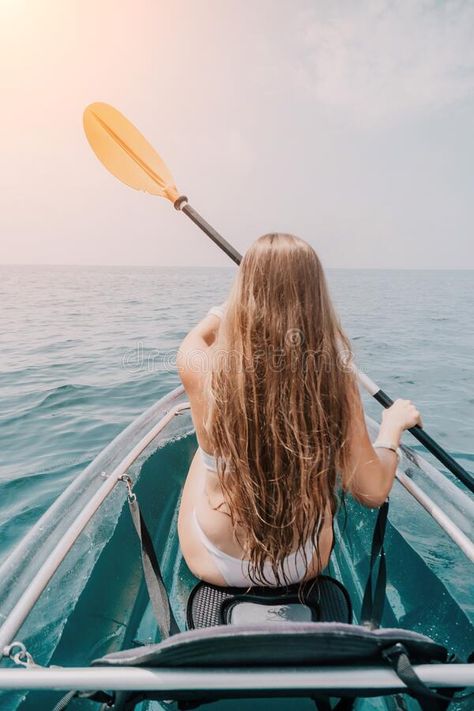 Woman in kayak back view. Happy young woman with long hair floating in transparent kayak on the crystal clear sea royalty free stock photography Transparent Kayak, Hair Floating, Kayak Pictures, Hair Advertisement, Woman With Long Hair, Clear Sea, Back View, Stock Photography Free, Young Woman