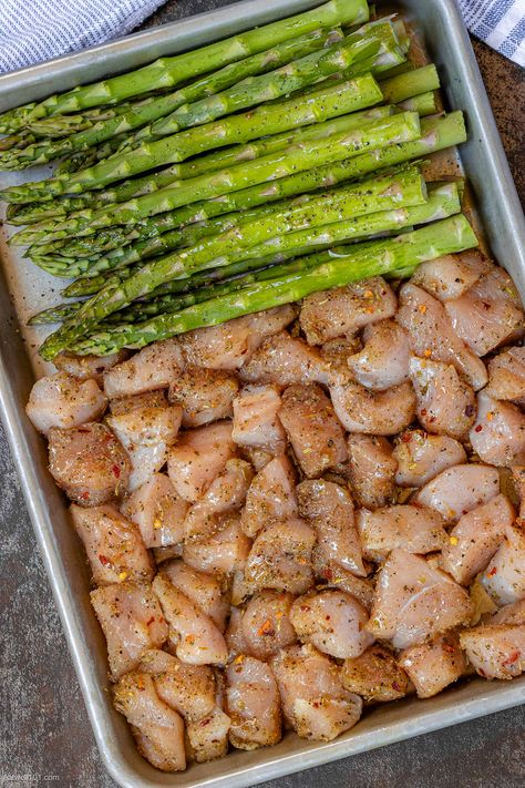 Lemon Garlic Butter Chicken Bites with Asparagus - #baked #chicken #recipe #asparagus #eatwell101 - The chicken bites are so juicy, tender, and delicious you’ll eat them hot right off the sheet pan! CLICK HERE to Get the Recipe - #recipe by #eatwell101® Chicken And Asparagus One Pan Meal, Sheet Pan Chicken Potatoes Asparagus, Baked Chicken Asparagus, One Pan Chicken Asparagus, Chicken Tenders And Asparagus Recipes, Baked Chicken And Asparagus Recipes, Chicken Tender Sheet Pan Recipes, Health Dinner Sides, Chicken Recipes With Asparagus