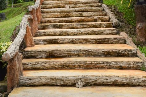 How to Cut Steps Into a Dirt Slope | Hunker Stairs On A Hill, Paver Steps, Landscape Stairs, Landscaping On A Hill, Landscape Steps, How To Build Steps, Sloped Yard, Vegetable Garden Tips, Building Stairs