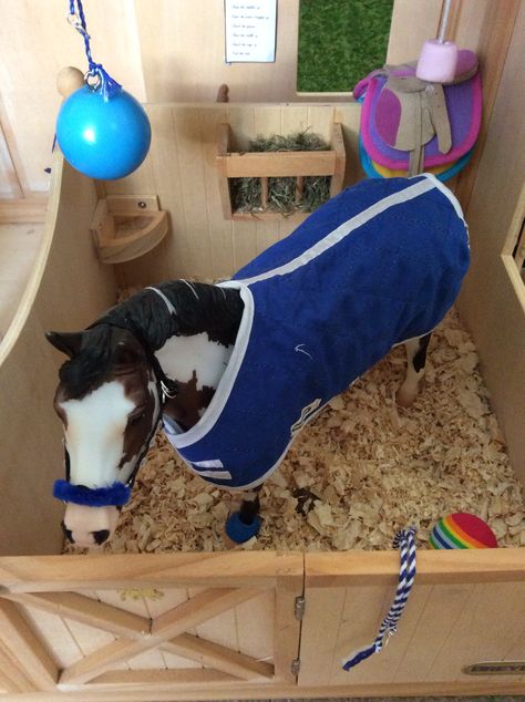 First, you want to start by putting down either a mat (Some breyer barns have this included) or shavings. Personally, I think shavings look more realistic, but they do make a mess. Second, you coul… Schleich Horses Stable, Toy Horse Stable, Schleich Diy, Joululahjat Diy, Horse Tack Diy, Diy Horse Barn, Barn Stalls, Hamster Bedding, Horse Toys