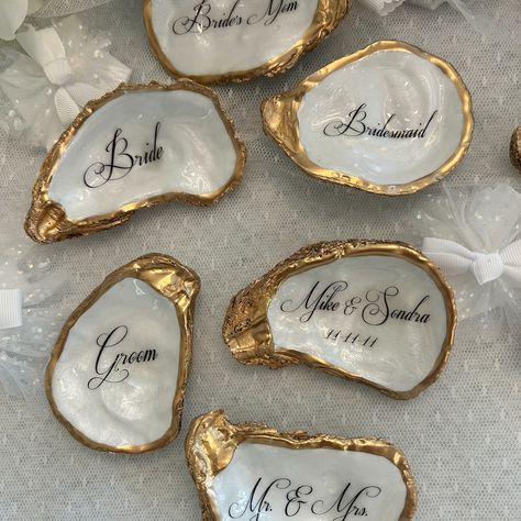 Oyster Shell Place Cards, Wedding Place Cards, Oyster Place Cards, Oyster Wedding Favor, Wedding Place cards, Wedding Decor, Pearl Wedding Handmade gifts for all of life’s special occasions. Shop on our Etsy link below https://www.etsy.com/shop/tidesoftimedesigns Custom Oyster Shell Mother of The Bride with Wedding Date - Thoughtful Gift for the Moms - Mother of the Groom - Step Mom, bridesmaids, bridal party, wedding rehearsal dinner guests, and more. ❤️Thank you for looking and hope we... Coastal Rehearsal Dinner, Dinner Guest, Wedding Place Settings, Time Design, Wedding Rehearsal Dinner, Wedding Rehearsal, Pearl Wedding, Oyster Shell, Wedding Place Cards