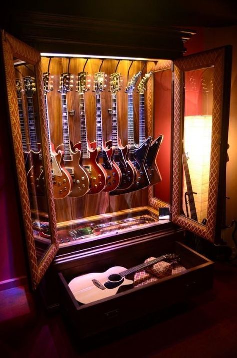 Wooden cabinet design ideas for book diy that you can make in your home 35 Guitar Storage Cabinet, Guitar Display Case, Ideas Armario, Ruangan Studio, Guitar Storage, Guitar Display, Home Music Rooms, Guitar Rack, Hollywood Vintage