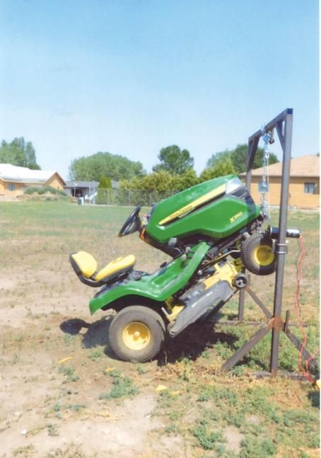 “After moving to town and not having a loader tractor anymore to lift the front of my riding mower, I tried several ways to get the job done - including using hi-lift jacks and several types of ramps,” says Greg Waldie, Miles, City. Used Garden Tractors, Yard Tractors, Lawn Mower Repair, Lawn Mower Tractor, Technology Hacks, Riding Lawn Mowers, Riding Mower, Diy Chicken Coop, Garden Tractor