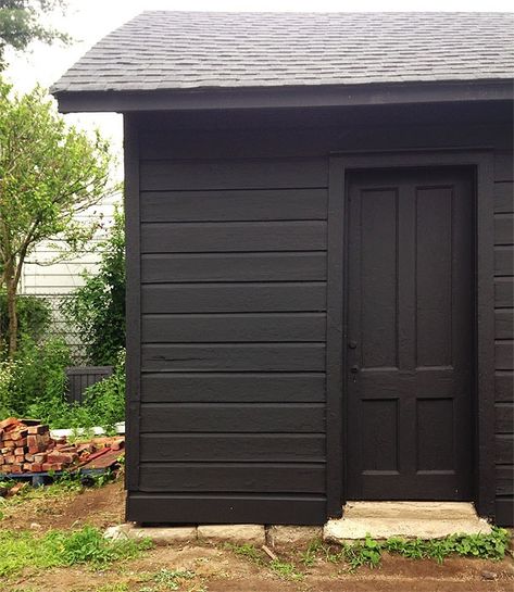 Blacktop Benjamin Moore Exterior, Garages Painted Black, Benjamin Moore Onyx Exterior, Benjamin Moore Blacktop, Daniel Kanter, House Black Trim, White House Black Trim, Restoring Old Houses, Black Shed