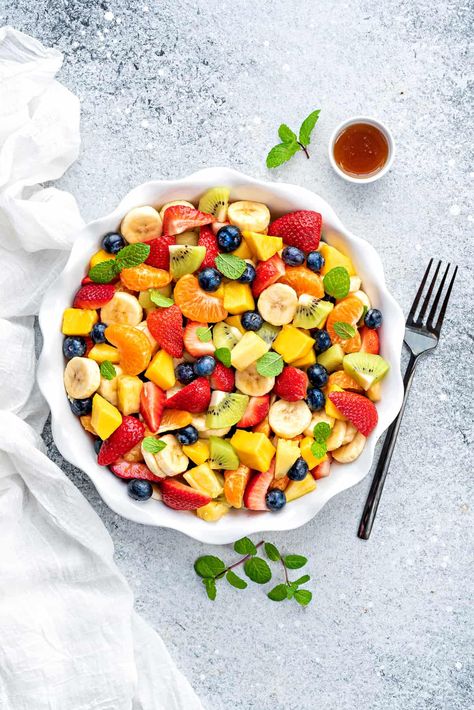 This classic Fresh Fruit Salad is a super simple, and easy recipe of sweet seasonal fruits tossed with a bright ginger honey lime dressing. Enjoy this summer salad with fruits as a light meal, snack or a healthy dessert! Perfect side dish for your picnics, potlucks, BBQ or holiday parties. Fresh Fruit Salad Recipe, Honey Lime Dressing, Dressing For Fruit Salad, Fruit Salad Recipe, Ginger Honey, Summer Salads With Fruit, Seasonal Fruits, Church Family, Fresh Fruit Salad