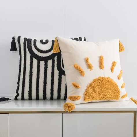 Two boho style cotton throw pillows, one is black and white, the other white with a yellow sun Sun Circle, فن النسيج, Needle Cushion, Cat Pillow Cover, White Cushion Covers, Textured Throw Pillows, Cushion Cover Designs, Punch Needle Patterns, Boho Throw Pillows