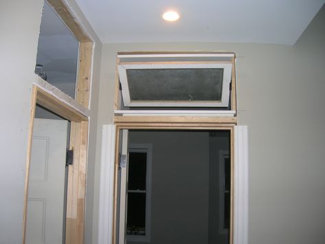 Build you own Transom window on the pivot hinge Indoor Transom Window Ideas, Pocket Door With Transom Window, Interior Doors With Transom Windows, Transom Above Interior Door, Mid Century Transom Windows, Transom Windows Interior, Installing A Transom Window, Pivot Window, Center Pivot Window