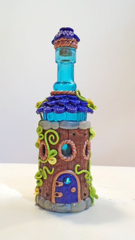 Fairy House: Blue Glass Bottle Home | MiniWhimsies Dark Blue Door, Blue Glass Bottle, Clay Fairy House, Fairy House Diy, Blue Roof, Handmade Fairy, Blue Glass Bottles, Fairy Home, Jar Art