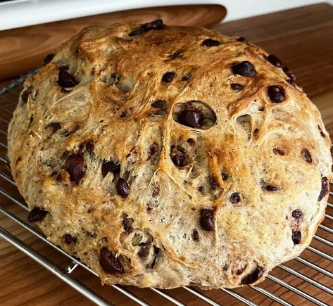 Quick and Easy Chocolate Chip Cookie Bread - Chocolate chip bread is delicious for several reasons:Sweetness: Chocolate chip bread is sweet, thanks to the sugar and chocolate chips, which are both high in natural sugars. This combination of textures can be very appealing to our taste buds. #chocolatechipbread#homemadebread#bakingfromscratch#chocolatelover#sweettreats#foodporn#bakersofinstagram Dutch Oven Sweet Breads, Dutch Oven Dessert Bread, Artisan Bread Inclusions, Sweet Artisan Bread, Chocolate Chip Cookie Focaccia, Cinnamon Chocolate Chip Bread, Chocolate Chip Breakfast Bread, Sweet Dutch Oven Bread, Sweet Artisan Bread Recipes