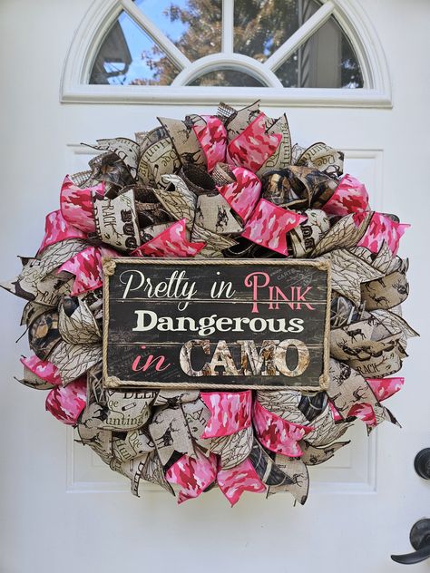 Pretty in Pink, Dangerous in Camo Wreath Measures approx 26" in diameter by 6" in depth. Made from burlap, camoflauge, hunting, and pink camoflauge ribbon, and a sign. Pink Camo Baby Shower Ideas, Camo Baby Shower Ideas, Camo Crafts, Pink Camo Party, Camo Wreath, Hunting Wreath, Camo Birthday Party, Whimsical Wreath, Baby Shower Camo