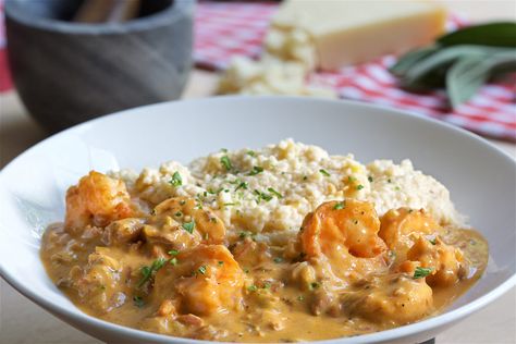 Shrimp-N-Grits - Harry's Restaurant Creamy Slaw, Basil Cream Sauce, Cattle Grazing, Cajun Shrimp And Grits, Staple Foods, Shrimp N Grits Recipe, Cajun Sausage, Crispy Fries, Shrimp Creole