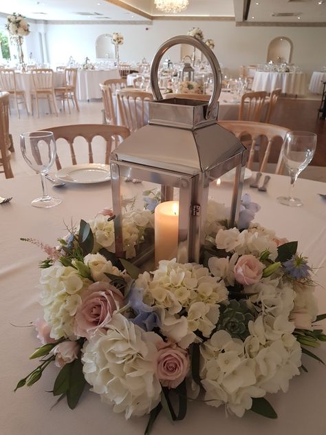 Wedding Lanterns And Flowers, Quince Lantern Centerpiece, Floral Lantern Centerpieces, Gold Lantern Centerpiece Wedding, Spring Quinceanera Theme, Lantern Centerpieces With Flowers, Centerpieces Quince, Lantern Floral Arrangements, Lantern Decor Spring