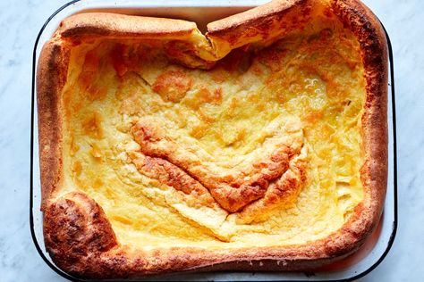 Classic Yorkshire pudding is the combination of a few humble ingredients—eggs, milk and flour—bolstered by the savory drippings from a large beef roast The recipe is simple, and relies upon just a few ingredients whisked together in a bowl then baked at a high temperature to achieve puffy, golden-brown perfection (Yorkshire pudding also happens to serve as a perfect accompaniment to said roast.) If you don’t have roast drippings, or run short on them, or are serving vegetarians, the recipe can Giant Yorkshire Pudding Recipe, Yorkshire Pudding Recipe, Yorkshire Pudding Recipes, Yorkshire Pudding, Nyt Cooking, Pudding Recipe, Roasted Carrots, Pudding Recipes, Roast Beef