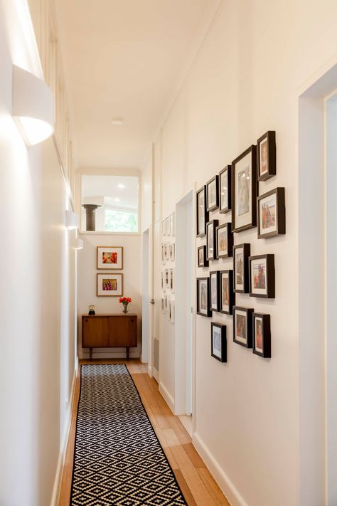 Mid-century modern elements have been kept in this renovated home, like the cabinet at the end of this hallway that leads to the children's bedrooms. #MidCenturyModern #Hallway Mid Century Modern Entryway, House In Australia, Entrance Hall Decor, Architecture Homes, Green Wall Color, Narrow Hallway Decorating, Chic Interior Design, Modern Entryway, Long Hallway