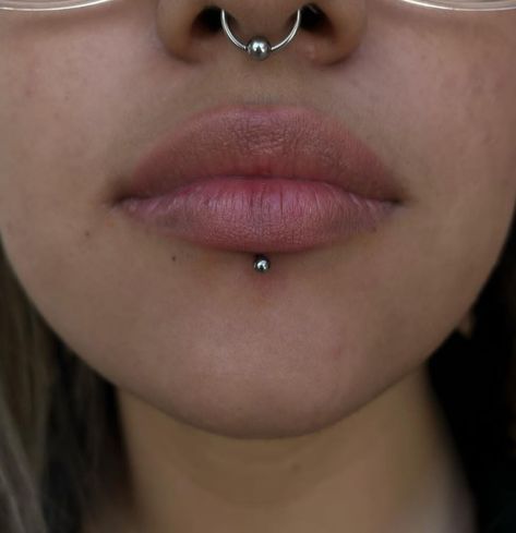 Bottom Lip Piercing: Types, Healing Time, and Aftercare Bottom Middle Lip Piercing, Underlip Piercings, Lower Labret Piercing, Bottom Lip Piercing Middle, Face Peircing, Central Labret Piercing, Piercings Black Women, Bottom Lip Piercing, Central Labret