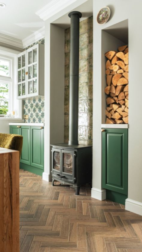 Evoking a literal and metaphorical sense of warmth, whilst also being highly convenient, this Signature Collection kitchen has a wall of firewood alongside the log burner. Who else is feeling  the autumn vibes? 🔥 Kitchen With Log Burner, Log Burner In Kitchen, Small Log Burner, Log Store, Kitchen Fireplace, Log Burner, Built In Cabinets, Kitchen Diner, Enchanted Forest