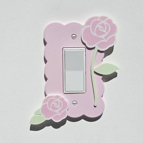 This listing is for a custom single pink cloud design light switch plate cover with pastel pink rose decoration design. This listing fits a single rocker switch but is available for single, double and triple rocker switch cover plates.  Perfect for toddlers room, kids room, nursery or anywhere a little creativity or brightness is wanted. Designed with pastel colors and a textured finish which shimmers in the light. Easy to install, just remove the old light switch cover and replace with your new Cute Switch Plates, Light Switch Covers Diy, Paris Room Decor, Girly Apartment Decor, Pink Room Decor, Cadeau Baby Shower, Pink Cloud, Hello Kitty Coloring, Old Lights