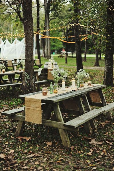 Getting married in a park? A simple runner over a picnic table elevates it to wedding-ready. Picnic Table Wedding, Wedding Picnic Reception, Wedding Reception On A Budget, Outdoor Picnic Table, Wedding Reception Layout, Reception Layout, Wedding Reception Ideas, Picnic Style, Picnic Wedding