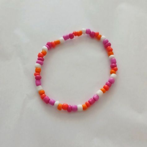 Hand Made Lesbian Strechy Bead Bracelet Lesbian Clay Bead Bracelet, Pink And Orange Bracelet, Cute Seed Bead Ideas, Lesbian Beaded Bracelet, Bracelet Seed Beads Ideas, Inside Out Bracelets, Lesbian Flag Bracelet, Orange Beaded Bracelets, Bracelet Ideas Seed Beads