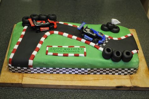 Go Karting Birthday Cake http://missstephanieusher.blogspot.co.uk/2014/05/go-karting-birthday-cake.html #bbloggers #lbloggers #blogpost #newpost #lifestyle #lifestylepost #homemade #birthdaycake #cakemaking #gokartingcake #gokarting #cake Go Kart Cakes, Go Kart Cake Ideas, Go Kart Birthday Cake, Go Kart Birthday Party Ideas, Go Kart Cake, F1 Cake, Dolphin Birthday Cakes, Go Kart Party, Racing Cake