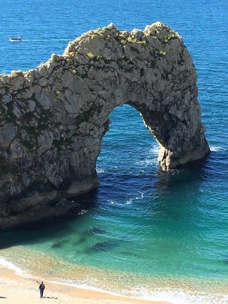 Exploring The Jurassic Coast In Dorset Jurassic Coast Dorset, Indoor Water Parks, Lovely Scenery, Lulworth Cove, Durdle Door, Amazing Places To Visit, Portland Stone, England Photography, Indoor Waterpark