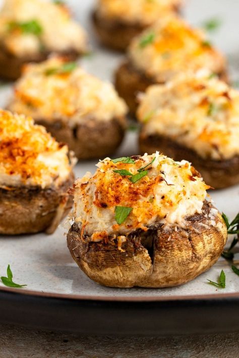 When it comes to appetizers, you can't go wrong with crab stuffed mushrooms! Learn how to make these easy bites, plus, get tips for the very best mushrooms. Easy Mushroom Recipes, Stuffed Mushrooms Easy, Stuffed Vegetables, Crab Stuffed Mushrooms, Cheese Stuffed Mushrooms, Crab Stuffed, Elegant Appetizers, Classic Appetizers, Stuffed Mushroom