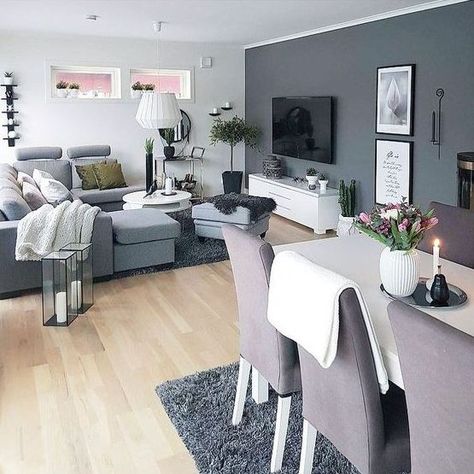 a graphite grey statement wall with artworks and a TV takes over the whole space giving it a modern feel Formal Living Room Designs, Contemporary Living Room Design, Apartment Living Room Design, Trendy Living Rooms, Design Room, Modern Houses, Room Decorations, Wallpaper Living Room, Living Room Grey