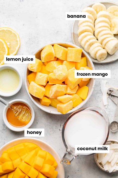 Mango, coconut milk, banan, honey, and lemon juice in separate bowls. Coconut Milk Smoothie Recipes, Pineapple Mango Smoothie, Tropical Ice Cream, Mango Coconut Smoothie, Coconut Milk Drink, Coconut Milk Smoothie, Mango Pineapple Smoothie, Mango Smoothie Recipes, Fruit Smoothie Recipes Healthy