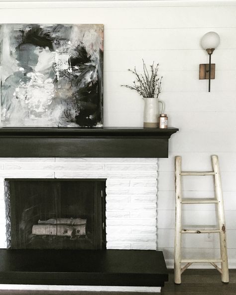 Brick Fireplace With Black Mantle, White Fireplace With Black Mantle, Fireplace With Black Mantle, White Fireplace Black Mantel, White Mantle Fireplace, Minimalist Mantle Decor, Black Mantle Fireplace, Painted Mantle, Black Mantle