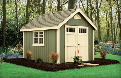 Green backyard shed with almond trim. I also love the forest setting in the background... Green Shed, Amish Sheds, Green Siding, New England Colonial, Shed Landscaping, Amish Barns, Yard Sheds, Backyard Storage Sheds, Build Your Own Shed