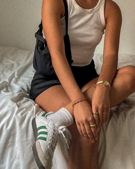 Fit check, disposable edit, gold jewelry, satin skirt outfit, adidas samba, clean girl aesthetic, white ribbed top, black satin skirt, white socks, outfit, style guide, hailey bieber style, close up, instagram photo inspo Green And White Sambas Outfit, Socks To Wear With Sambas, Outfits With White Sambas, White Samba Outfit, Adidas Samba White, Samba Adidas Outfit, Black Shorts Outfit, Rome Outfits, Cute Middle School Outfits