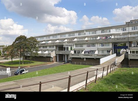 Download this stock image: Low rise housing blocks at Thamesmead, southeast London, the famous 1960s social housing project developed by the Greater London Council - PJ94AR from Alamy's library of millions of high resolution stock photos, illustrations and vectors. Southeast London, Social Housing, Greater London, Image Processing, Common Area, Home Projects, Low Rise, Google Images, Photo Image